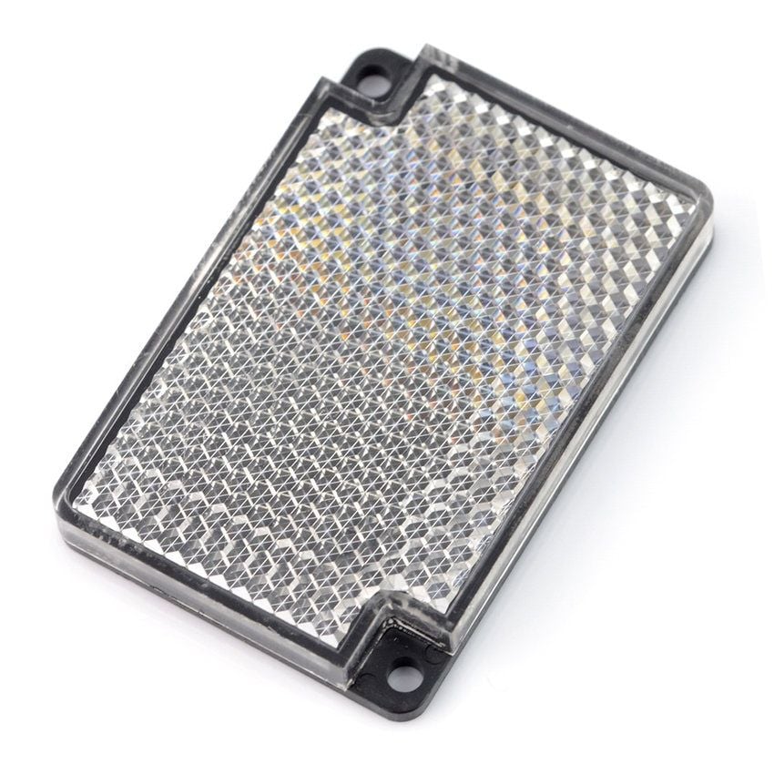 Reflektor for fotoelektrisk sensor med svart ramme og reflekterende overflate